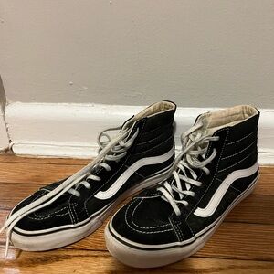 Vans Black and White Sneakers with High-Top Design